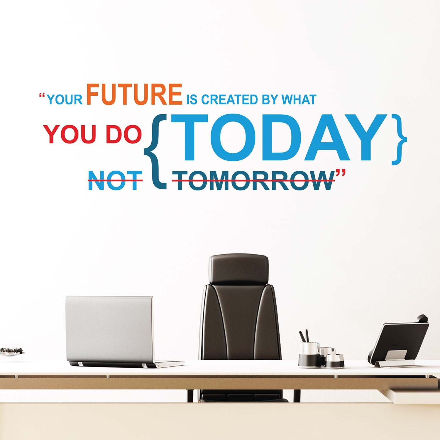 Inspirational quote wall sticker with the text "Your Future Is Created by What You Do Today, Not Tomorrow" applied on an office wall, motivational vinyl wall decal for workspace, study room, home office and corporate interiors.