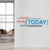 Inspirational quote wall sticker with the text "Your Future Is Created by What You Do Today, Not Tomorrow" applied on an office wall, motivational vinyl wall decal for workspace, study room, home office and corporate interiors.