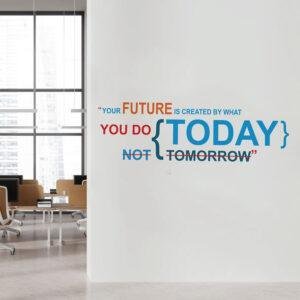Inspirational quote wall sticker with the text "Your Future Is Created by What You Do Today, Not Tomorrow" applied on an office wall, motivational vinyl wall decal for workspace, study room, home office and corporate interiors.