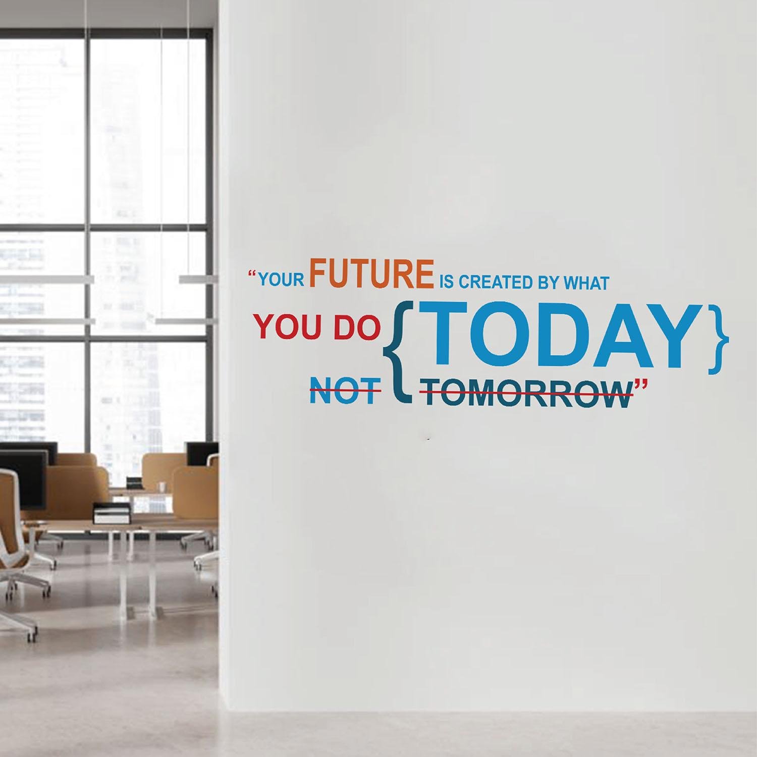 Inspirational quote wall sticker with the text "Your Future Is Created by What You Do Today, Not Tomorrow" applied on an office wall, motivational vinyl wall decal for workspace, study room, home office and corporate interiors.