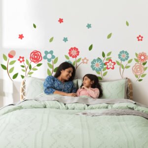 Colorful floral wall stickers for kids bedroom featuring pastel flowers and green leaves above bed decor