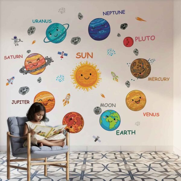 Kids room wall with colorful smiley solar system wall stickers including planets, sun, moon and space elements with child interacting