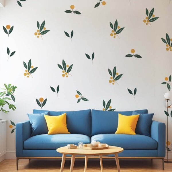 Minimalist botanical wall stickers featuring green leaves and yellow berry motifs arranged in a scattered pattern above a beige sofa in a modern living room.