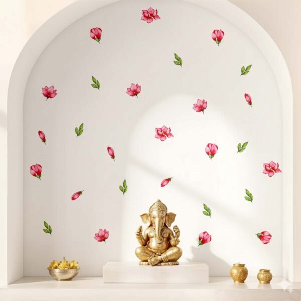 A modern living room featuring removable watercolor-style pink flower and green leaf wall stickers arranged across a white wall above a wooden daybed with patterned cushions.