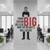 Think Dream Believe BIG motivational office wall sticker featuring bold black and red typography with a minimalist business silhouette displayed in a modern corporate workspace.