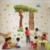Months of the Year educational tree wall sticker featuring January to December on wooden signboards with colorful birds, butterflies, flowers, and woodland animals for preschool classrooms and kids' learning spaces.