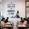 Mountain climber motivational wall sticker with inspirational success quote on an office workspace wall