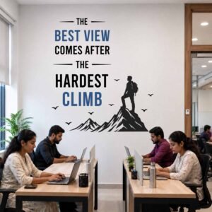 Mountain climber motivational wall sticker with inspirational success quote on an office workspace wall
