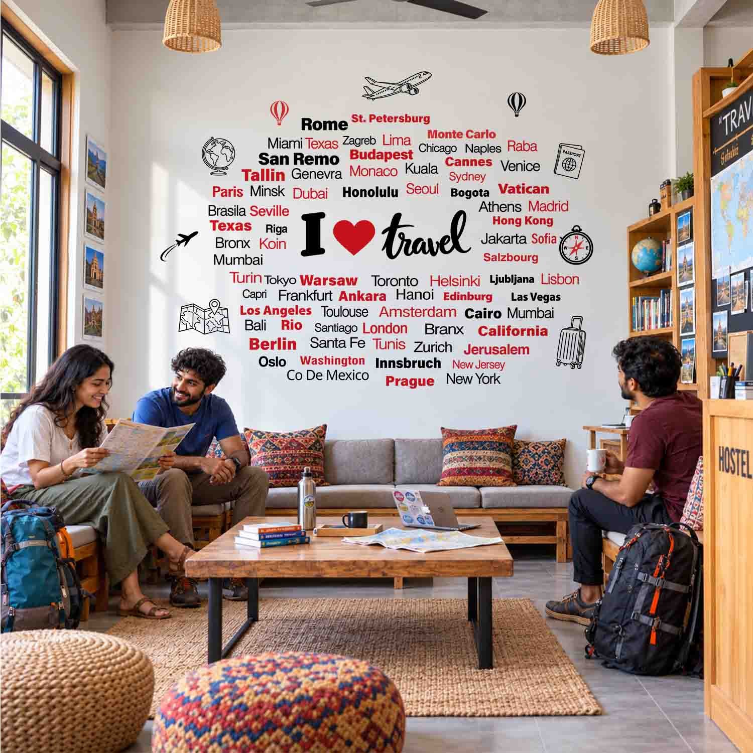 I Love Travel wall sticker with world city names and travel illustrations on a café wall